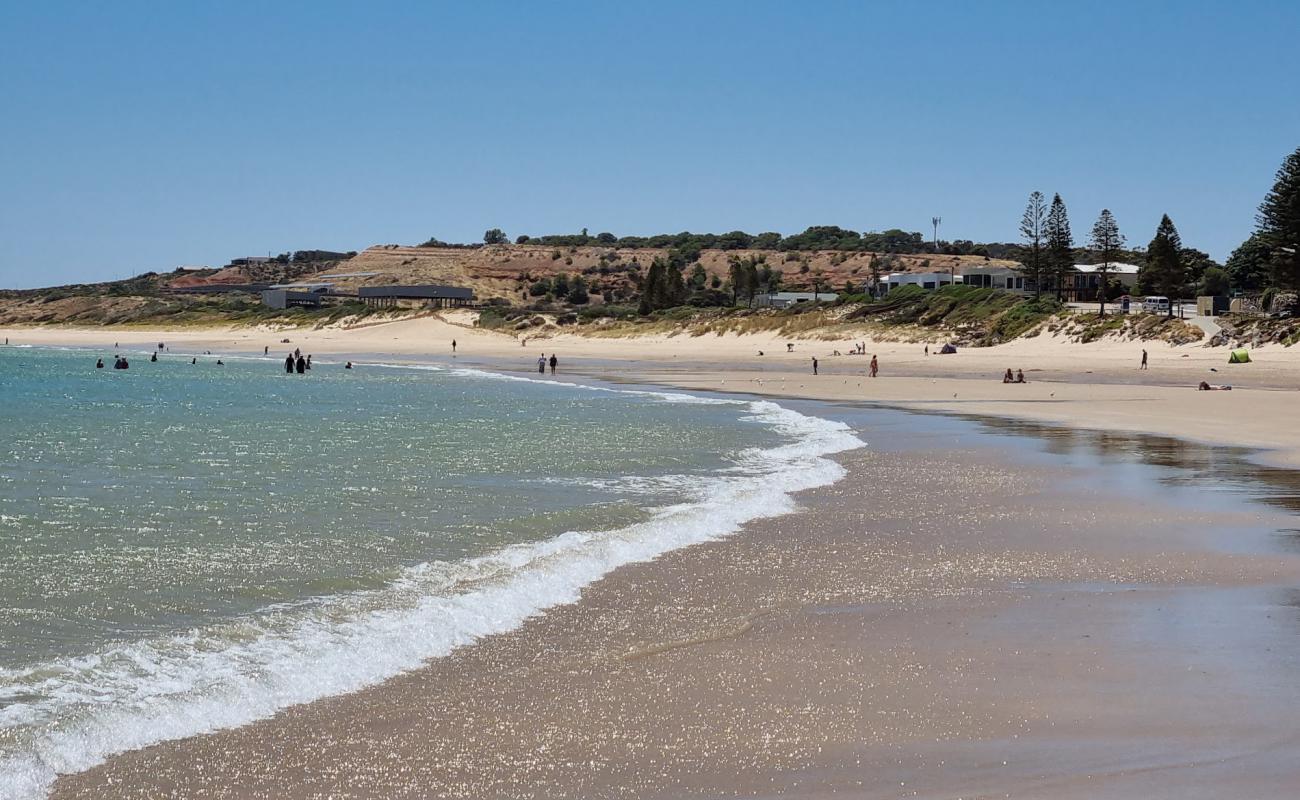 Photo of Christies Beach with bright fine sand surface