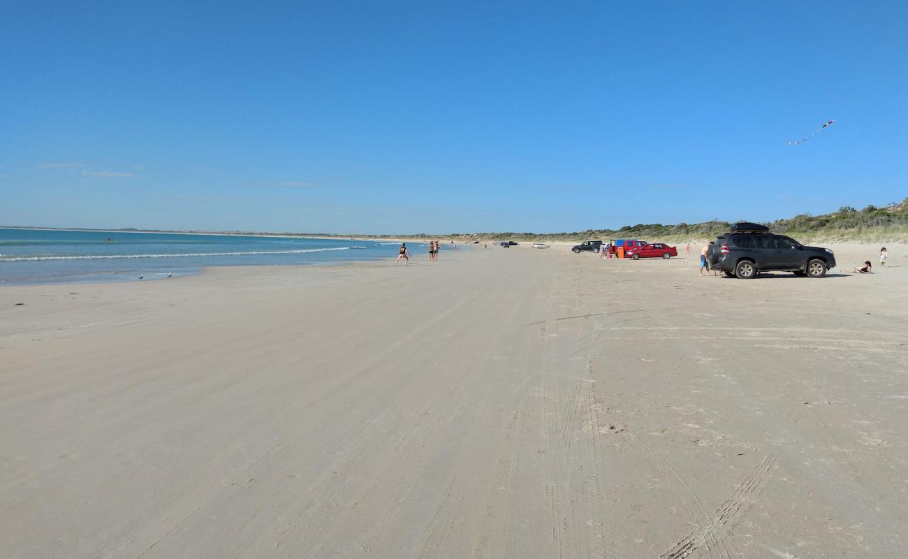 Photo of Long Beach with bright fine sand surface