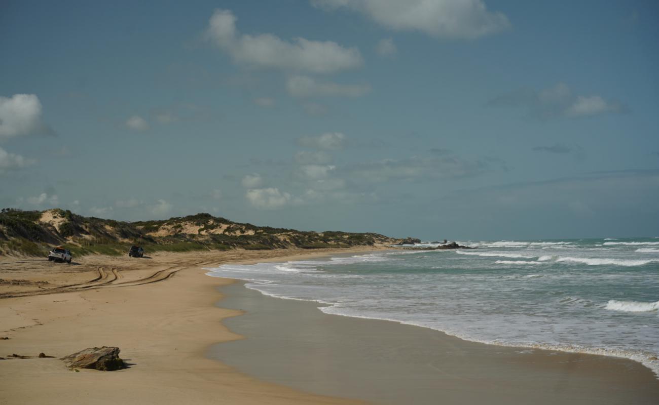 Photo of Back Beach with bright sand surface