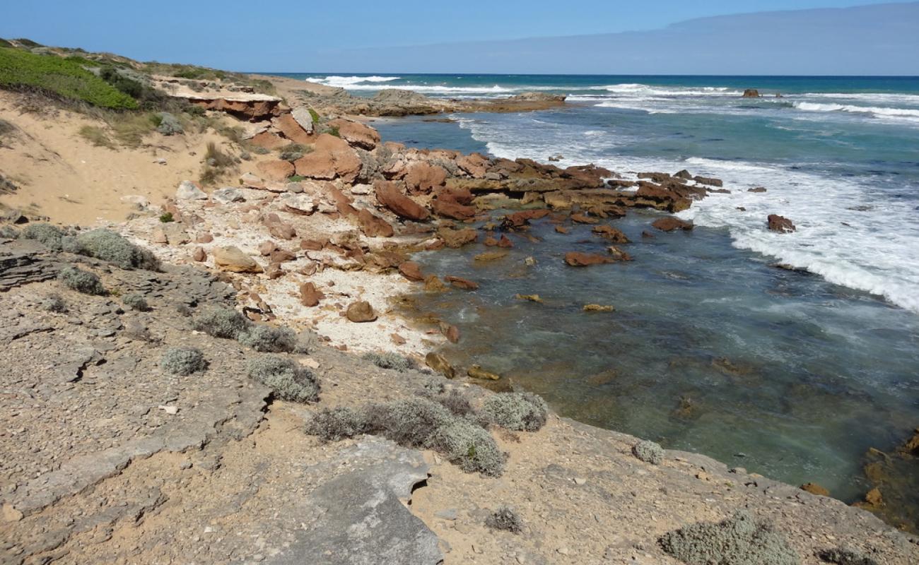 Photo of Shelly Beach, Warrnambool with rocks cover surface