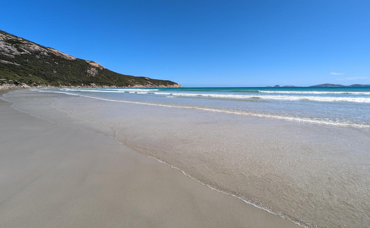 Photo of Norman Beach with bright fine sand surface