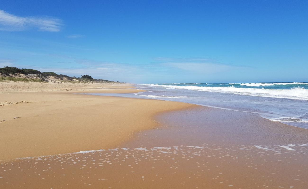 Photo of Mcloughlins Beach with bright sand surface