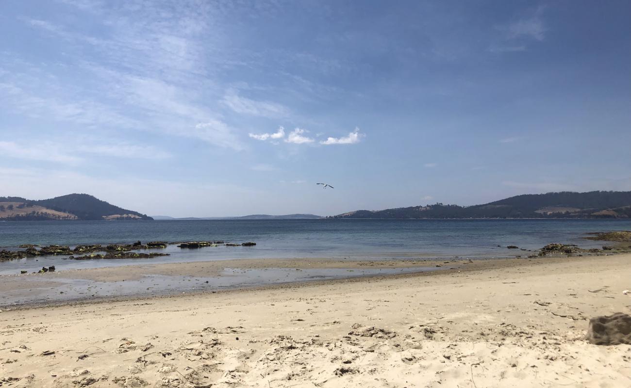 Photo of Legacy Beach with bright sand surface