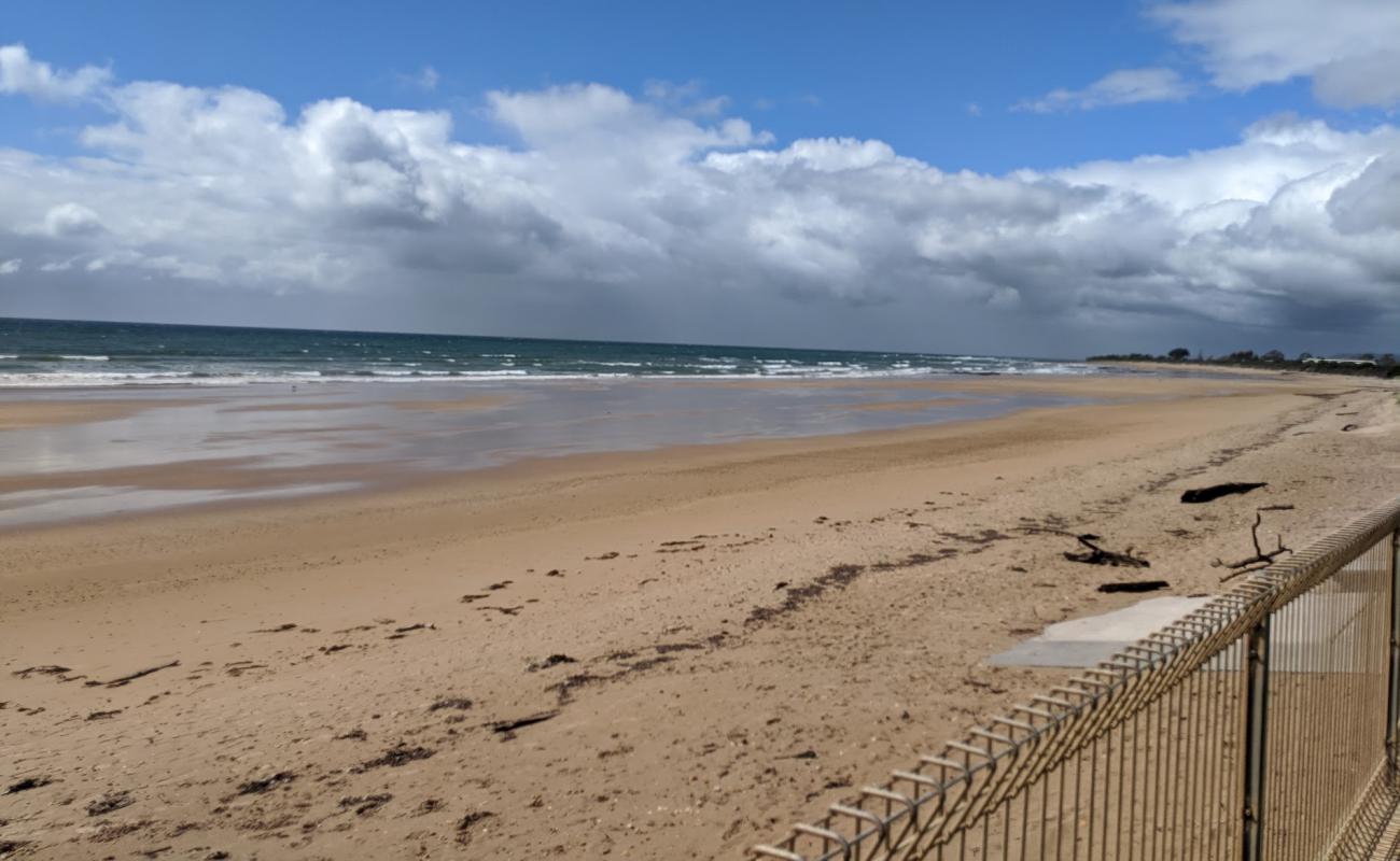 Photo of Buttons Beach with bright sand surface