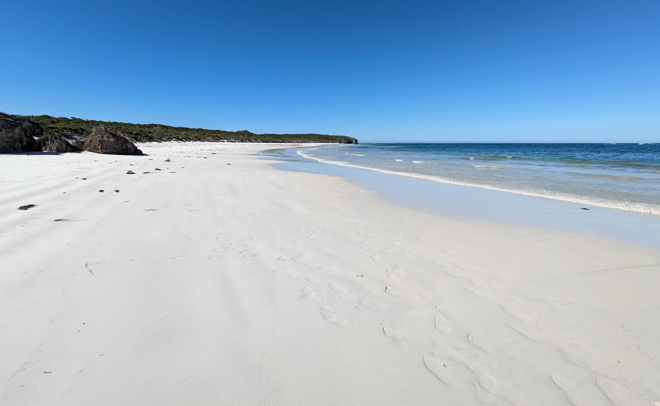 Photo of Wheaton's Beach with white sand surface