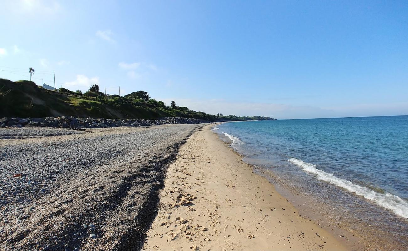 Photo of Roney Beach with light sand &  pebble surface