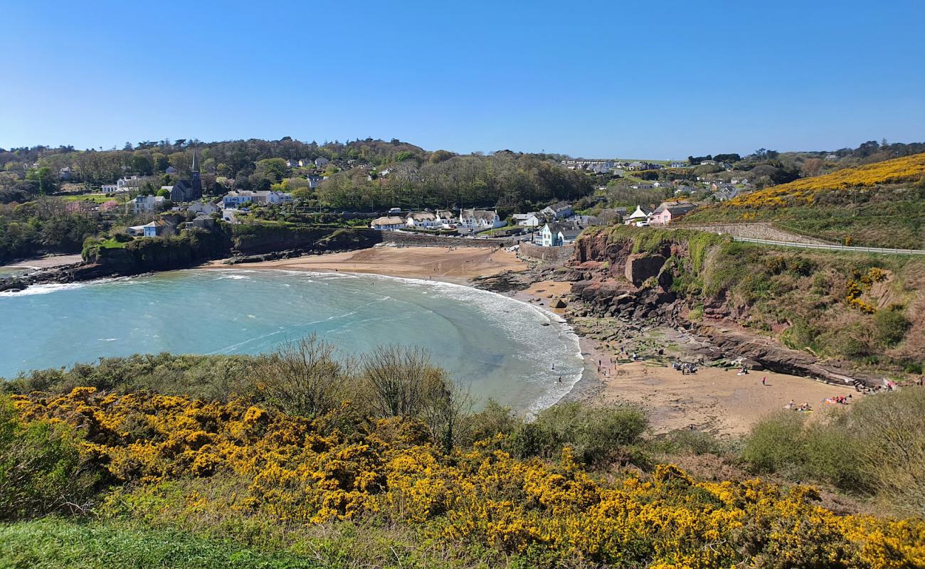 Photo of Councillors Beach with bright sand & rocks surface