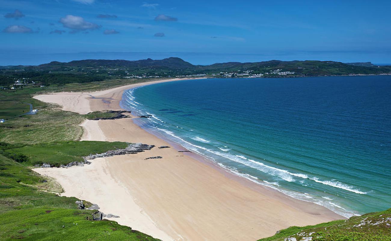 Photo of Ballymastocker Beach with bright sand surface