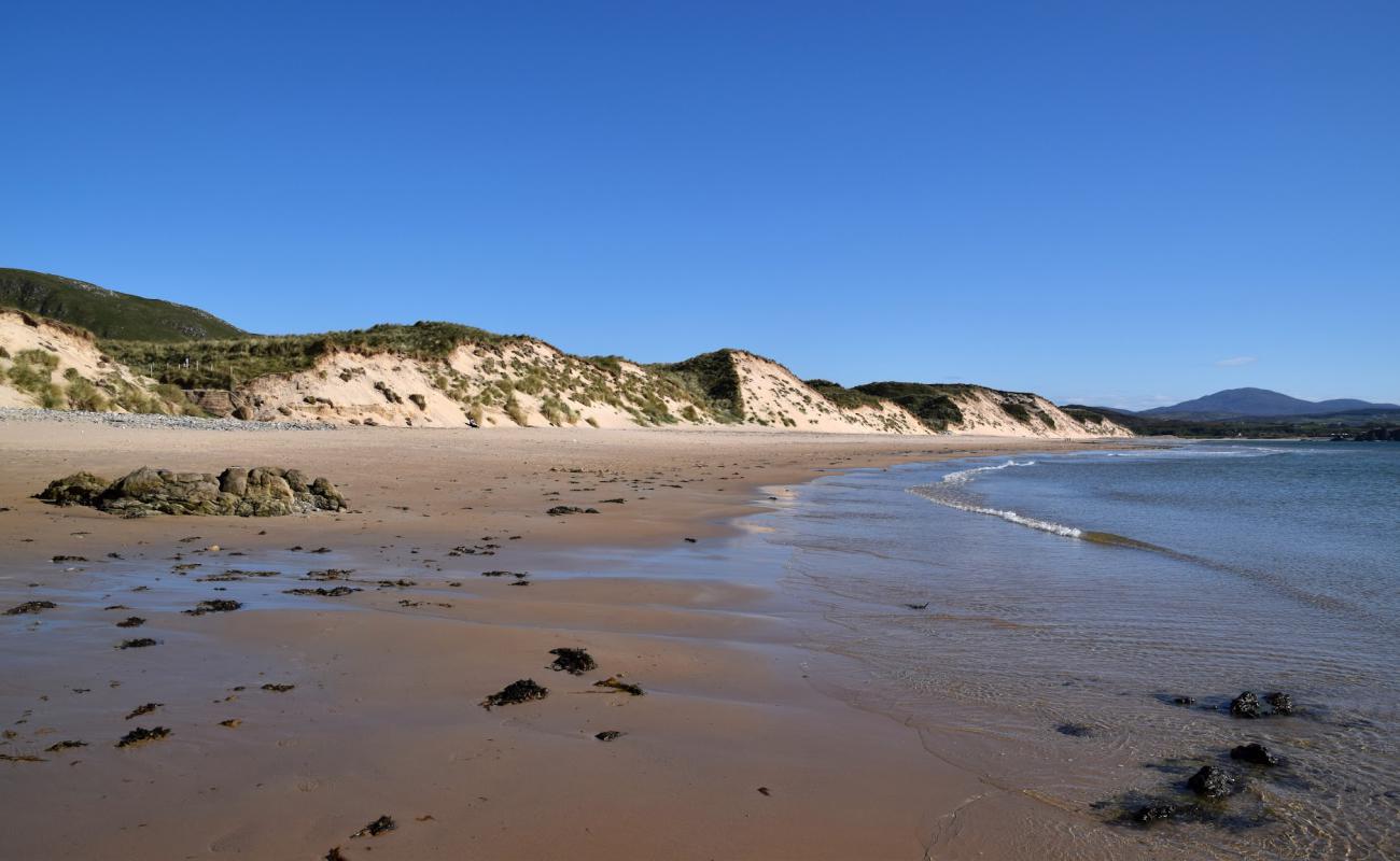 Photo of Five finger Beach with bright sand surface