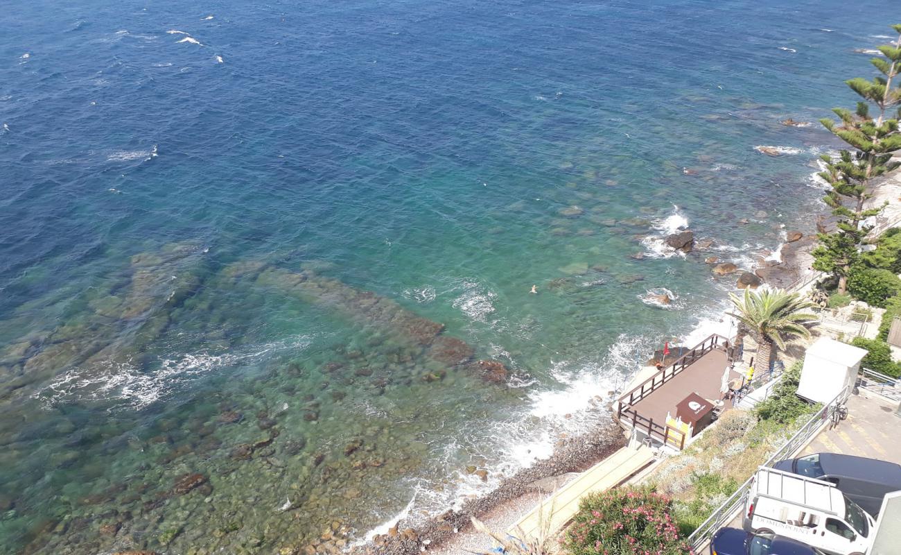 Photo of Caletta del Gabbiano with rocks cover surface