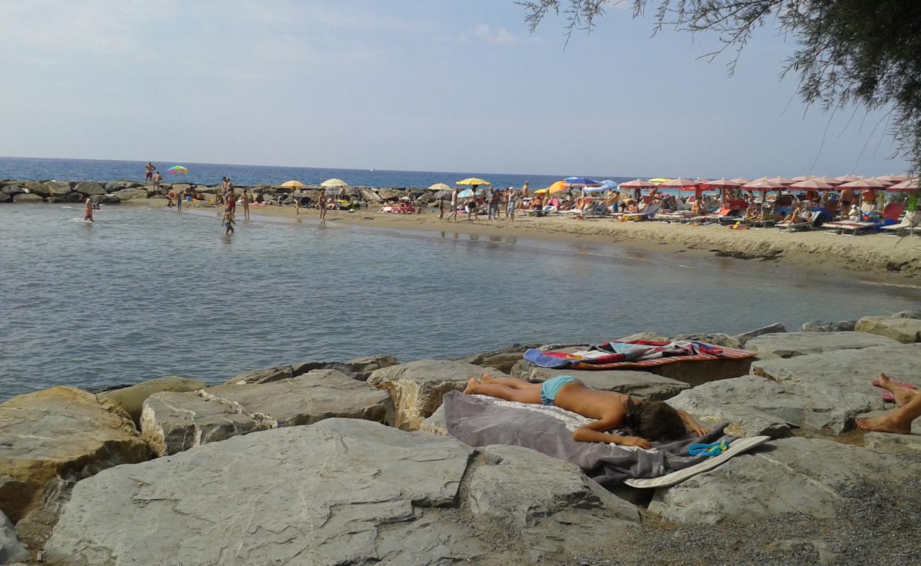 Photo of La Torre beach with brown sand surface