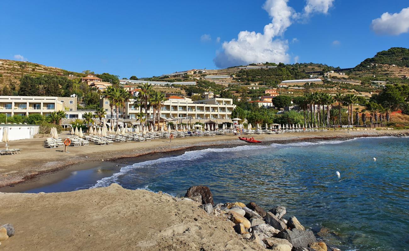 Photo of Marina Aregai beach with black sand & pebble surface