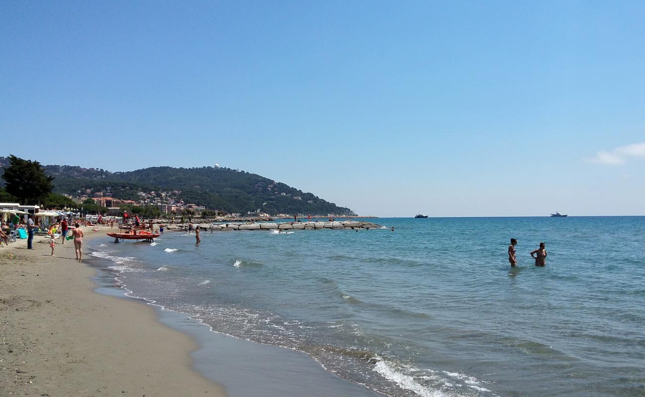 Photo of Andora beach II with brown sand surface