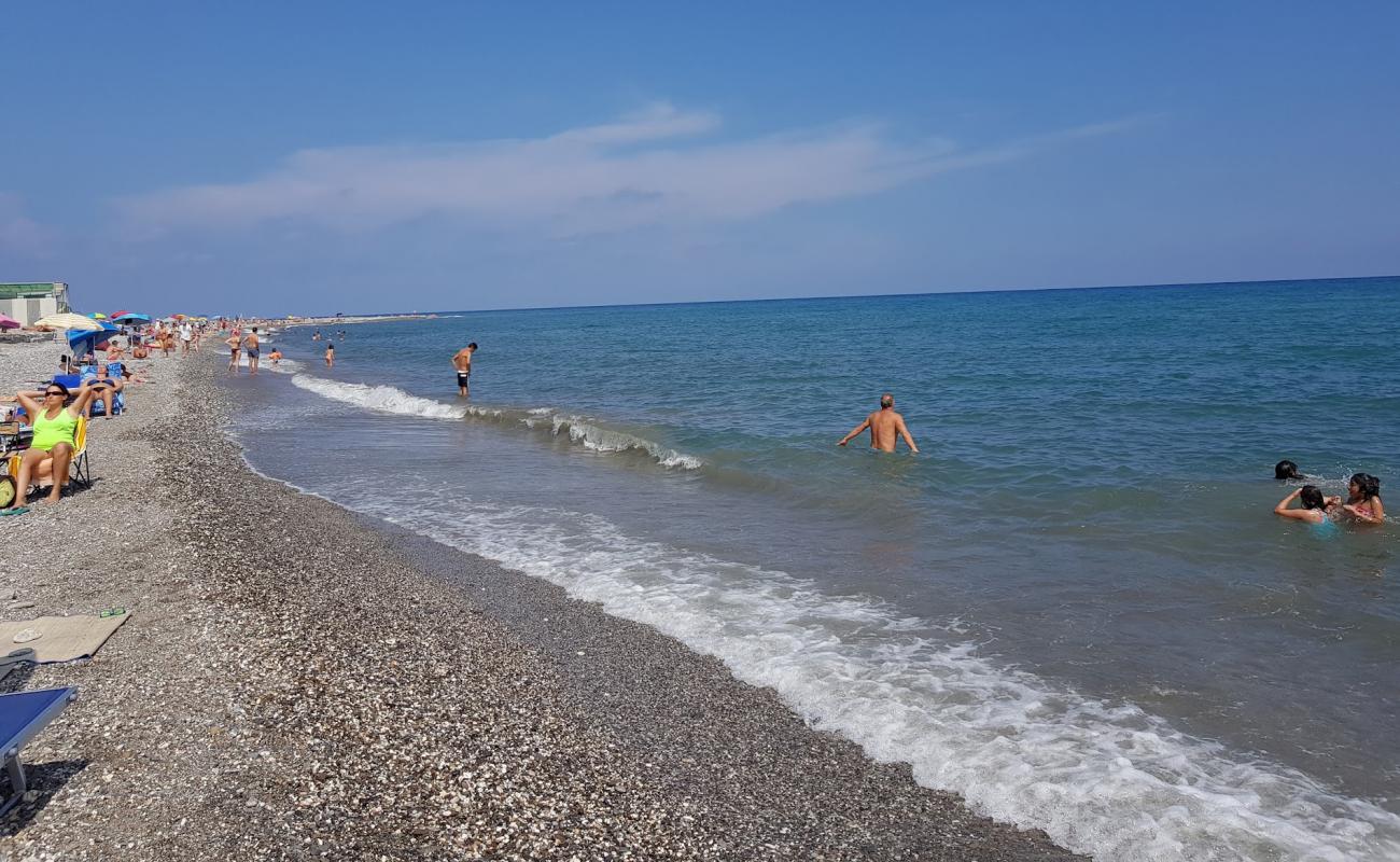 Photo of Capo Lena beach with black sand & pebble surface