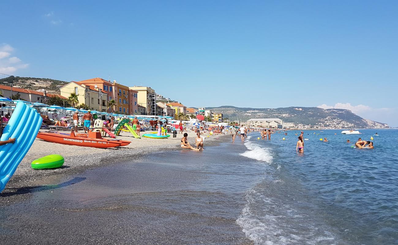 Photo of Spiaggia Pietra Ligure with black sand & pebble surface