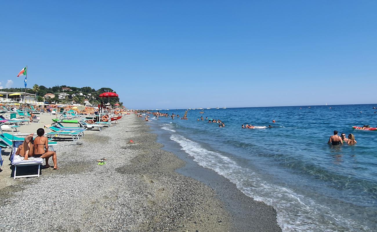 Photo of Albisola beach with brown sand surface