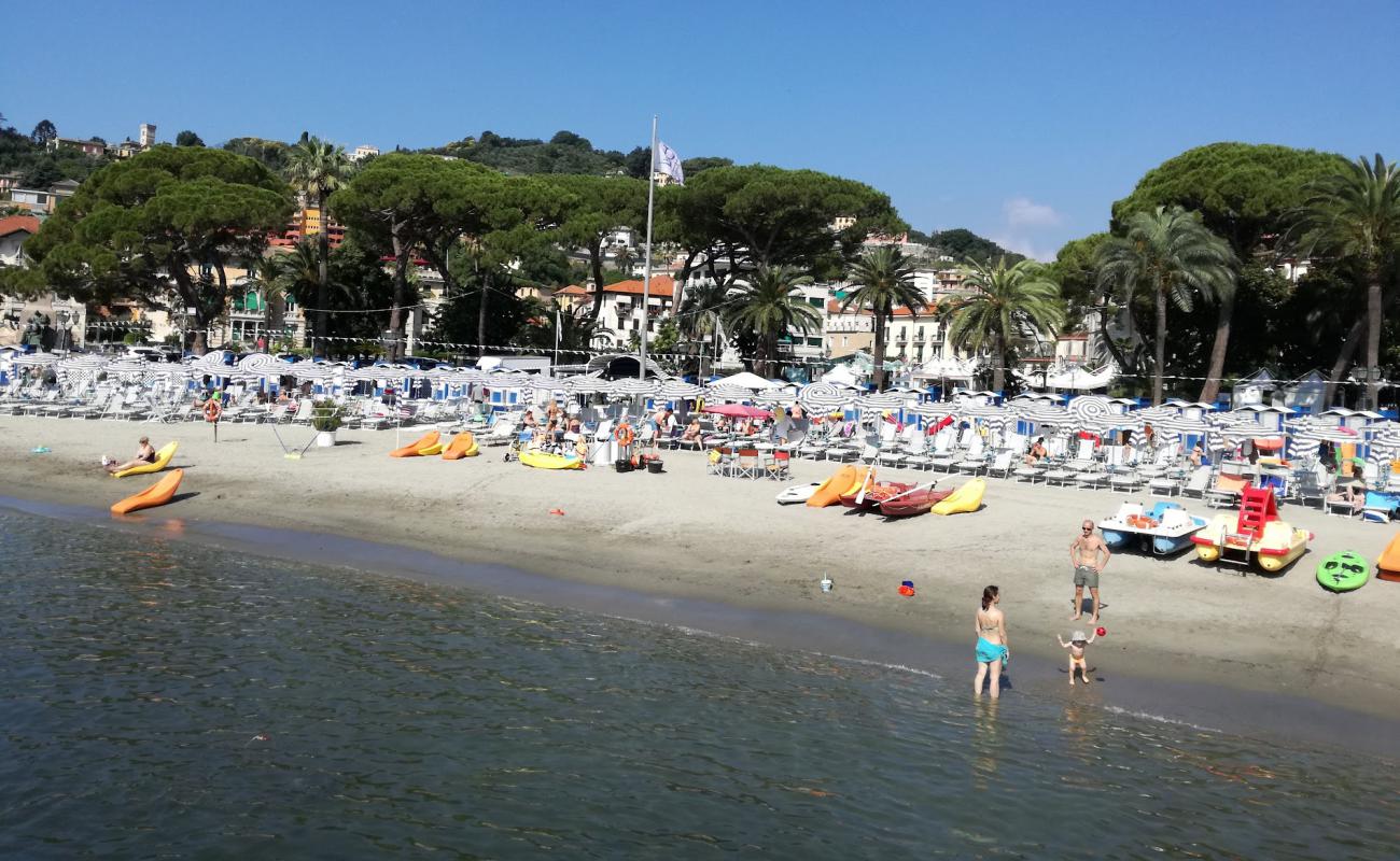 Photo of Rapallo beach with brown sand surface