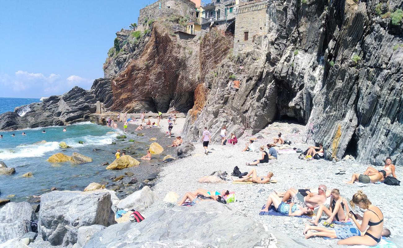 Photo of Vernazza Beach with rocks cover surface