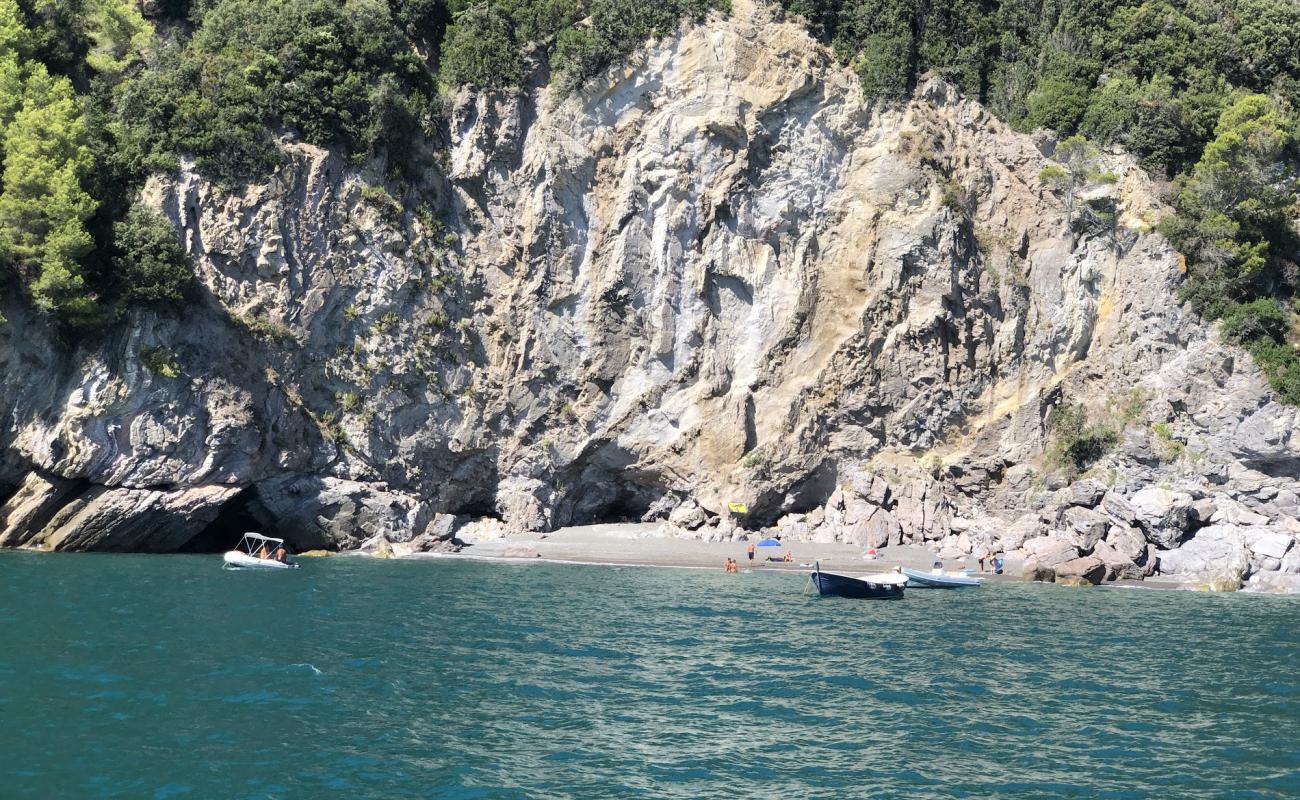 Photo of Spiaggia di Punta Bianca with black sand & pebble surface