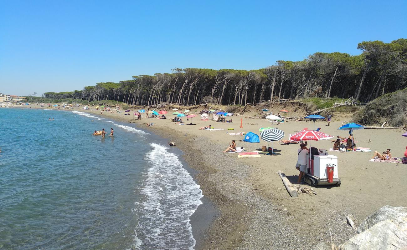 Photo of Spiaggia di Andalu with brown fine pebble surface