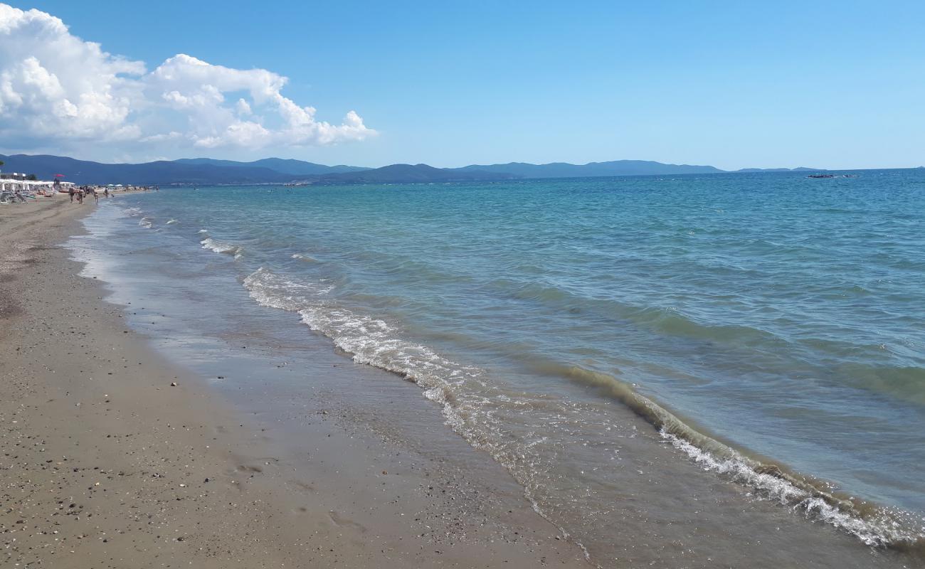 Photo of Follonica beach II with brown sand surface