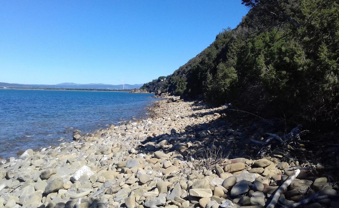 Photo of Cala Le Donne with rocks cover surface