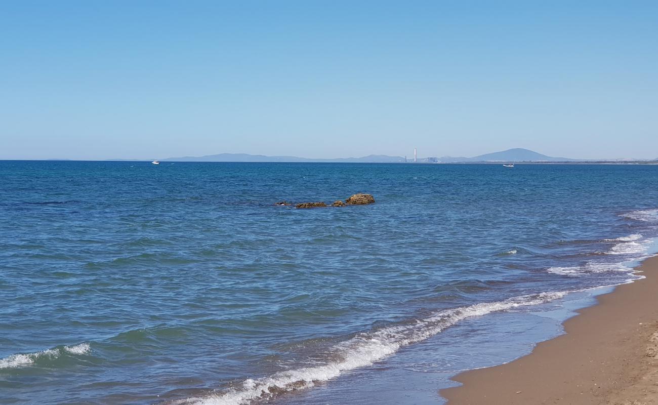 Photo of Camping Riva Dei Tarquini with brown sand surface