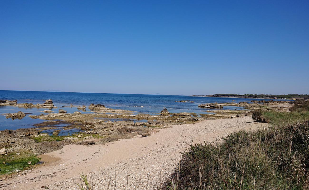 Photo of Tsunami Beach with rocks cover surface