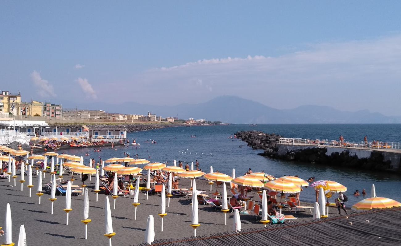 Photo of Spiaggia delle Mortelle II with gray sand surface