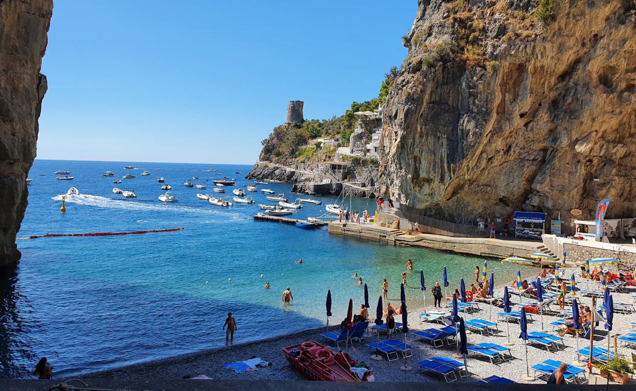 Photo of Marina di Praia with brown pebble surface