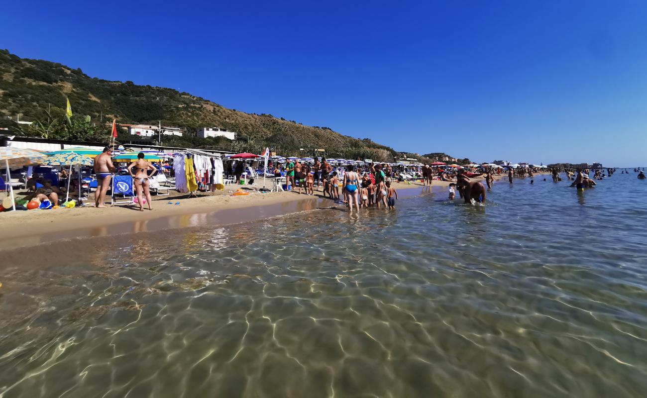 Photo of Acciaroli Beach with brown fine sand surface