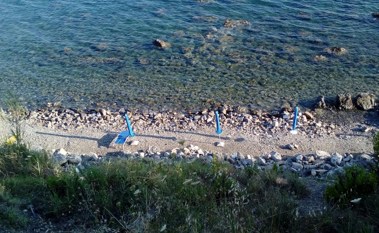 Photo of Pioppi beach II with rocks cover surface