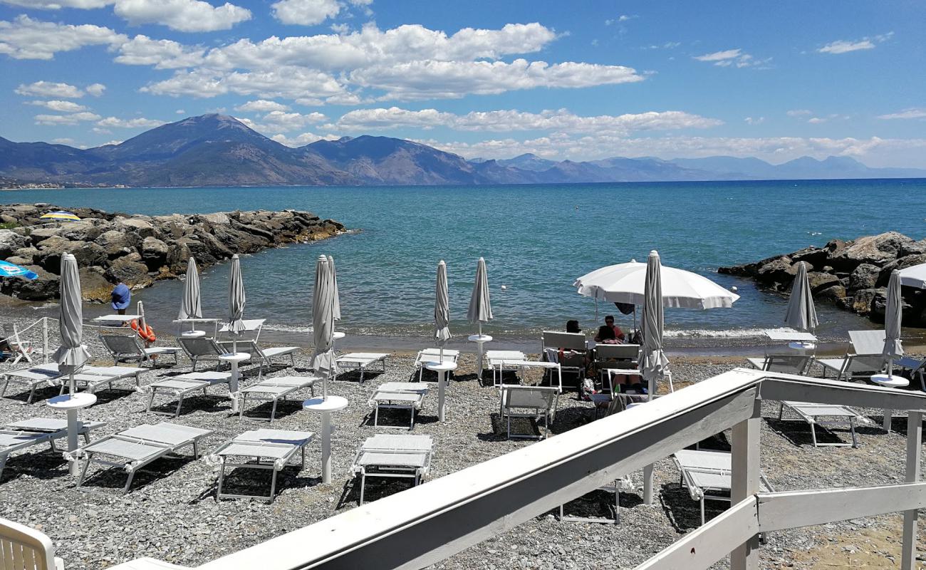 Photo of Bussentino port beach II with gray sand &  pebble surface