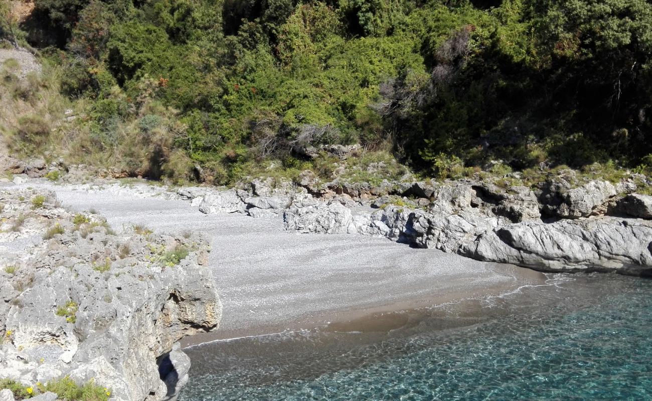 Photo of Spiaggia Pietra Caduta with gray fine pebble surface