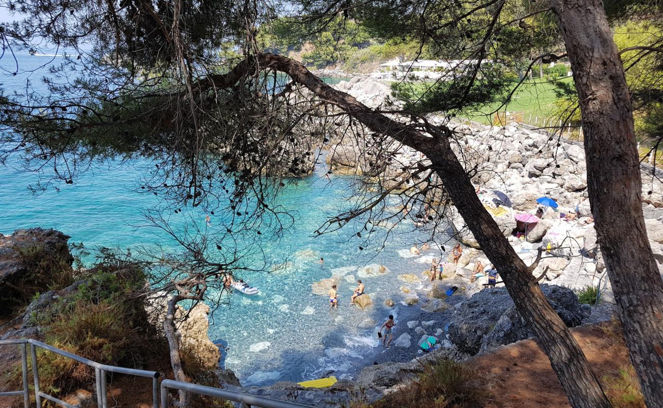 Photo of Cala Tunnara with rocks cover surface