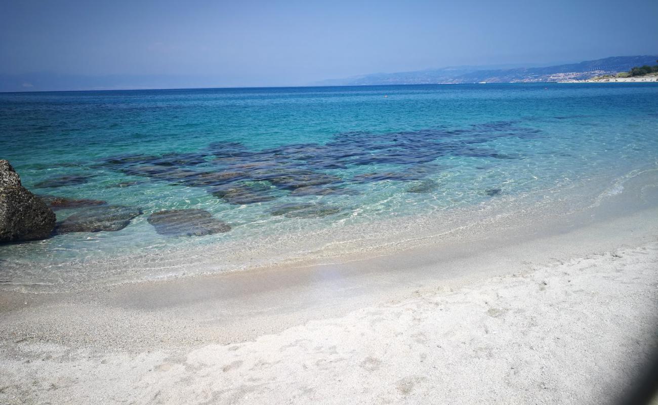 Photo of Spiaggia La Rocchetta with bright sand surface