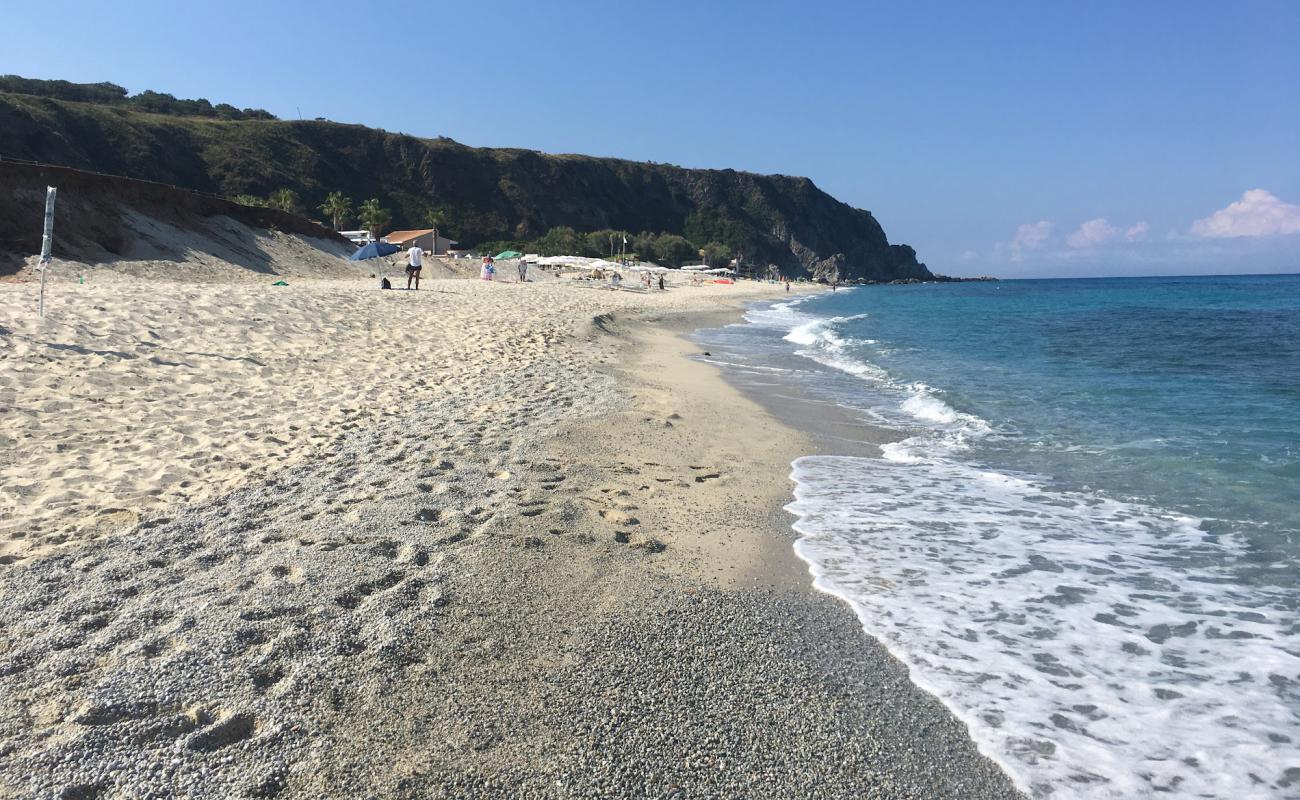 Photo of Spiaggia Tono with bright sand surface