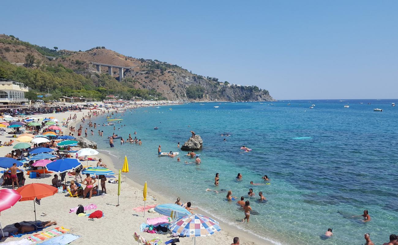 Photo of Caminia Beach with bright sand surface