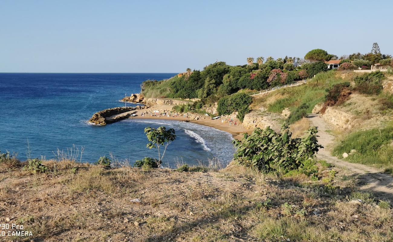 Photo of Spiaggia Capo Bianco with brown sand surface