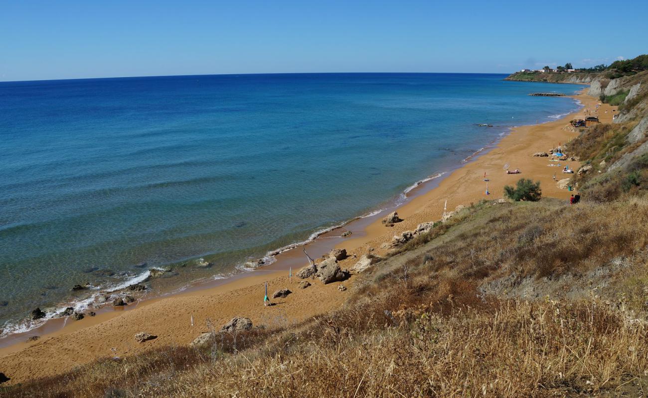 Photo of Santa Cristina beach II with brown sand surface