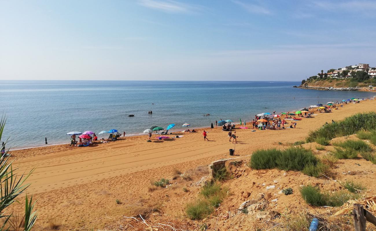 Photo of Spiaggia Le Cannella with brown fine sand surface