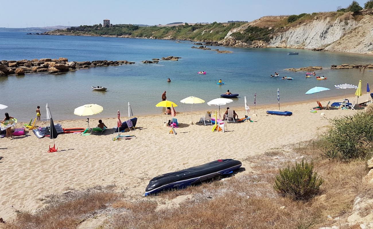 Photo of Baia dei Greci with brown sand surface