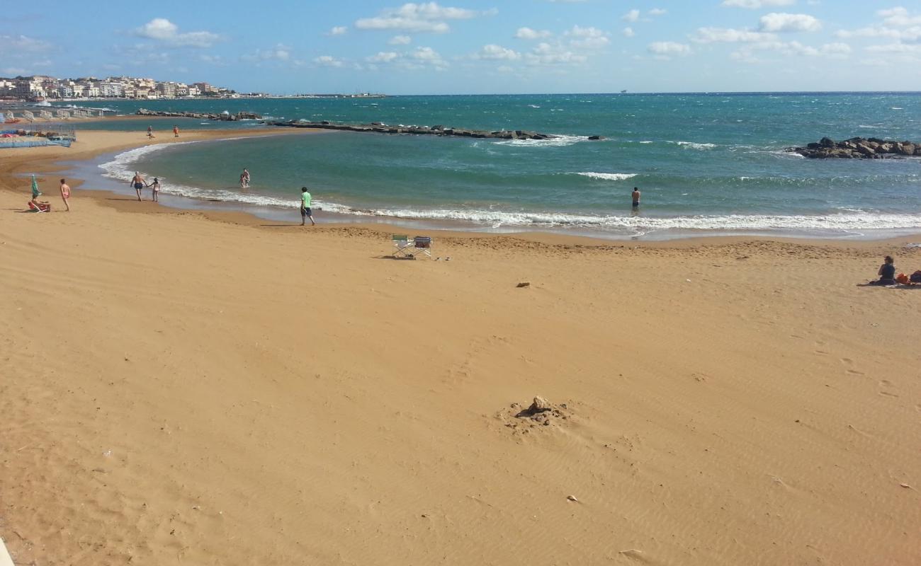 Photo of Crotone beach II with brown sand surface