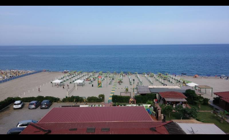 Photo of White beach with bright sand surface