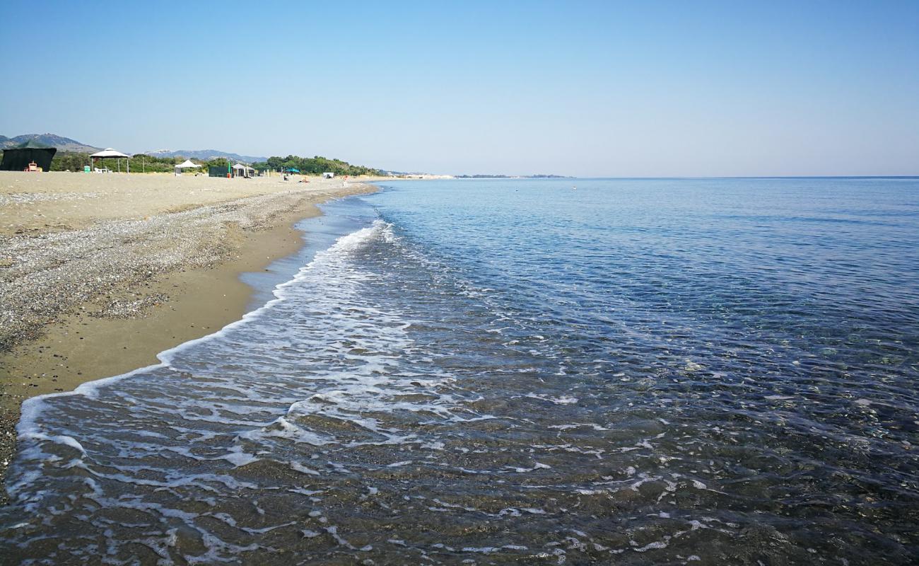 Photo of Spiaggia di Marinella with gray sand &  pebble surface