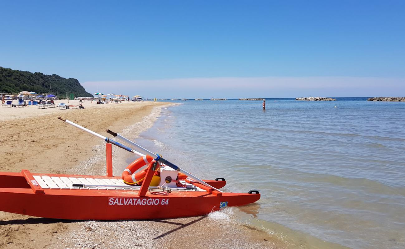 Photo of Oasi Beach with bright fine sand surface