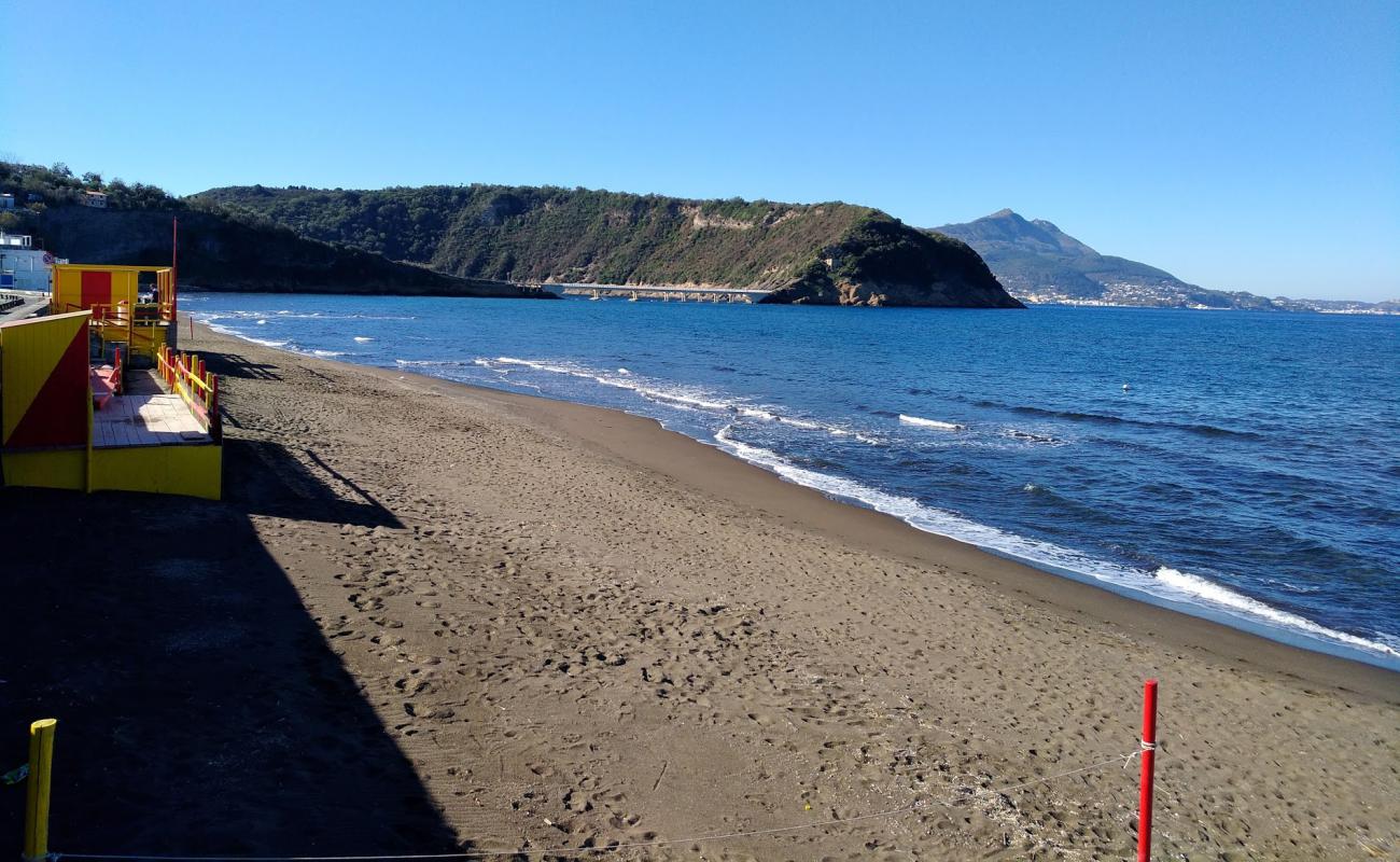 Photo of Spiaggia di Ciraccio with brown sand surface