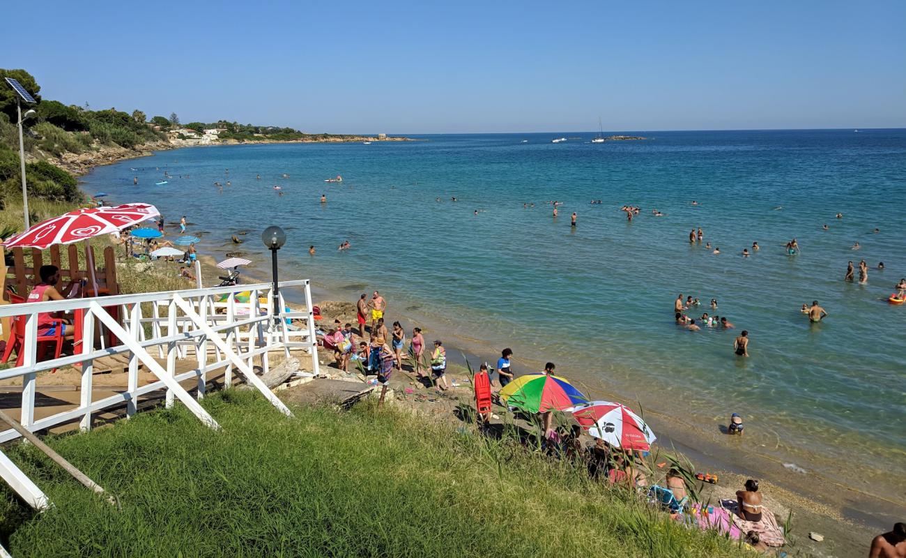 Photo of Spiaggia Fanusa with brown sand &  rocks surface