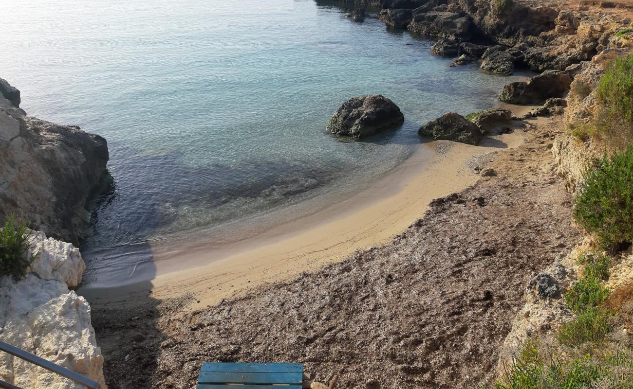 Photo of Playa Ognina with gray sand surface