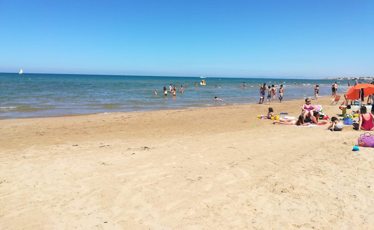 Photo of Spiaggia La Lanterna with bright fine sand surface